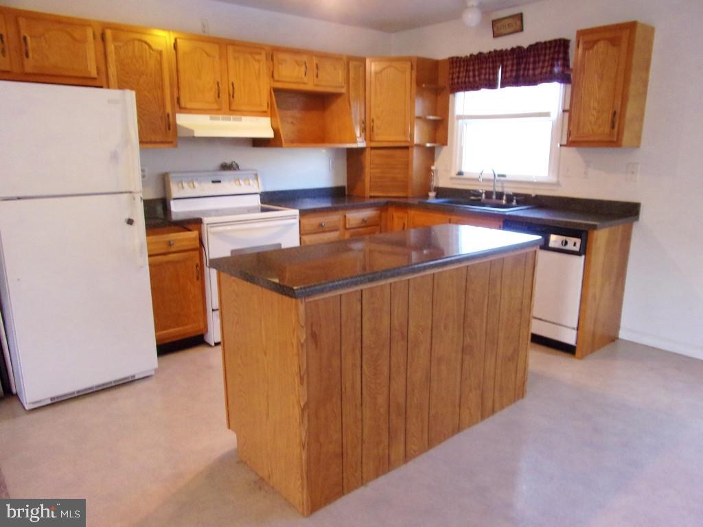 450 Evergreen Road New Bloomfield, PA 17068 - Photo 3 of 28 KITCHEN IS OPEN TO DINING AREA AND LIVING ROOM