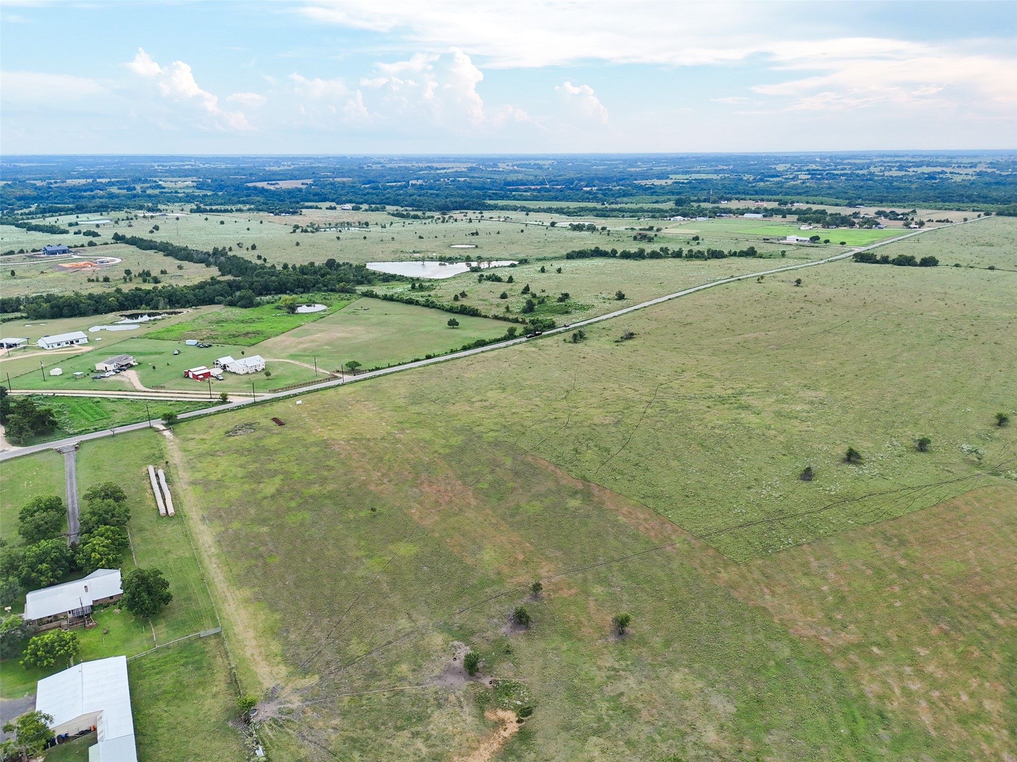 5211 Chadwick-Hogan Road Chappell Hill, TX 77426 - Photo 12 of 20 a view of an outdoor space with a lake view