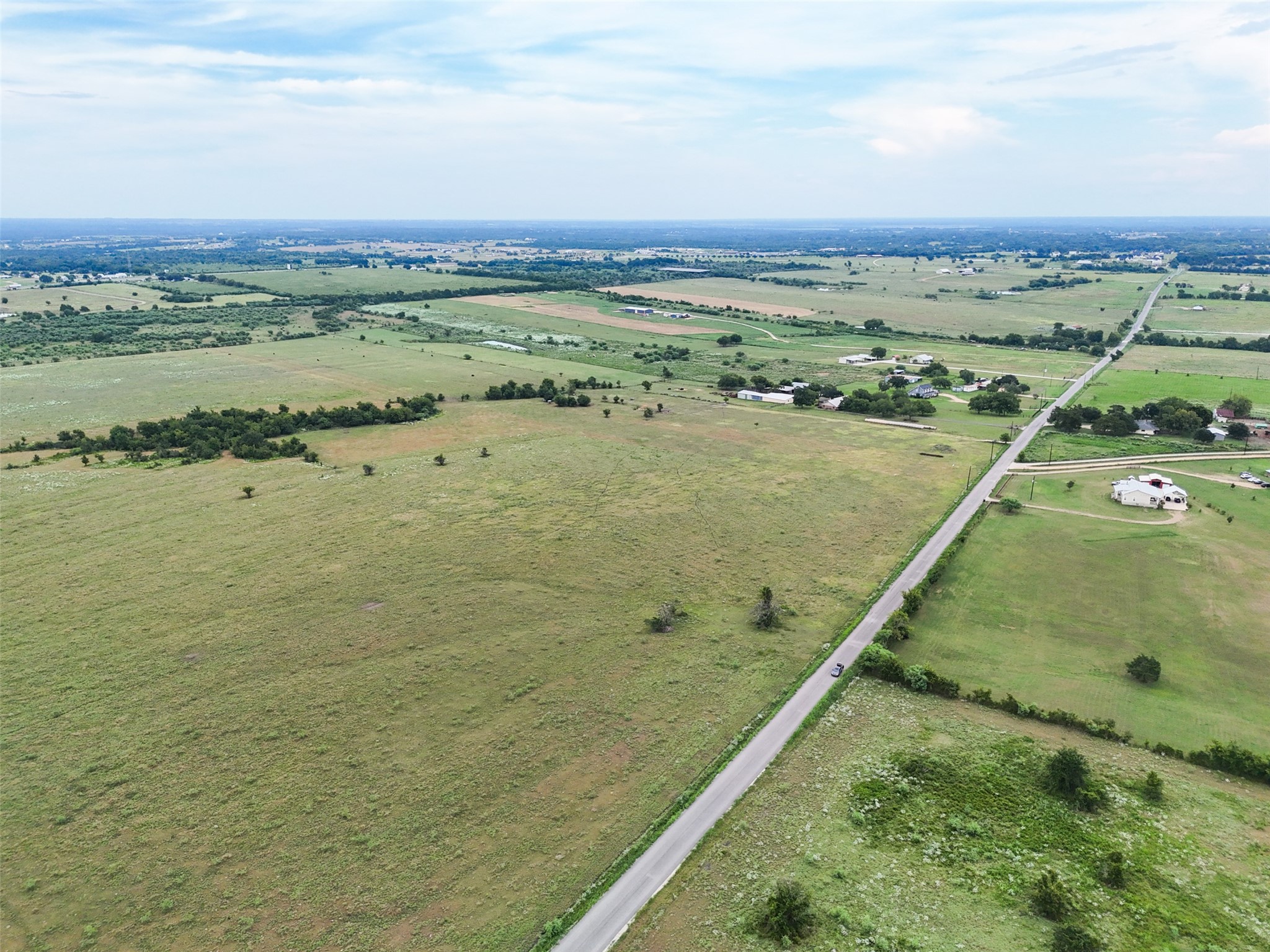 5211 Chadwick-Hogan Road Chappell Hill, TX 77426 - Photo 14 of 20 a view of an ocean and beach