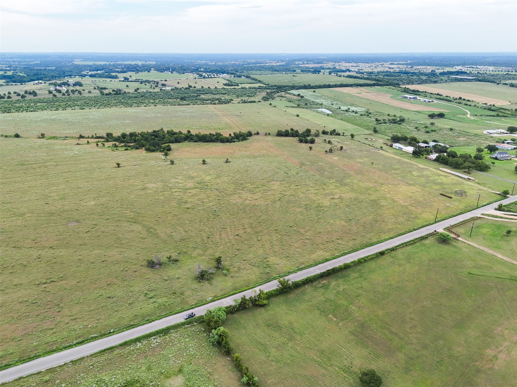 5211 Chadwick-Hogan Road Chappell Hill, TX 77426 - Photo 16 of 20 a view of an ocean and beach