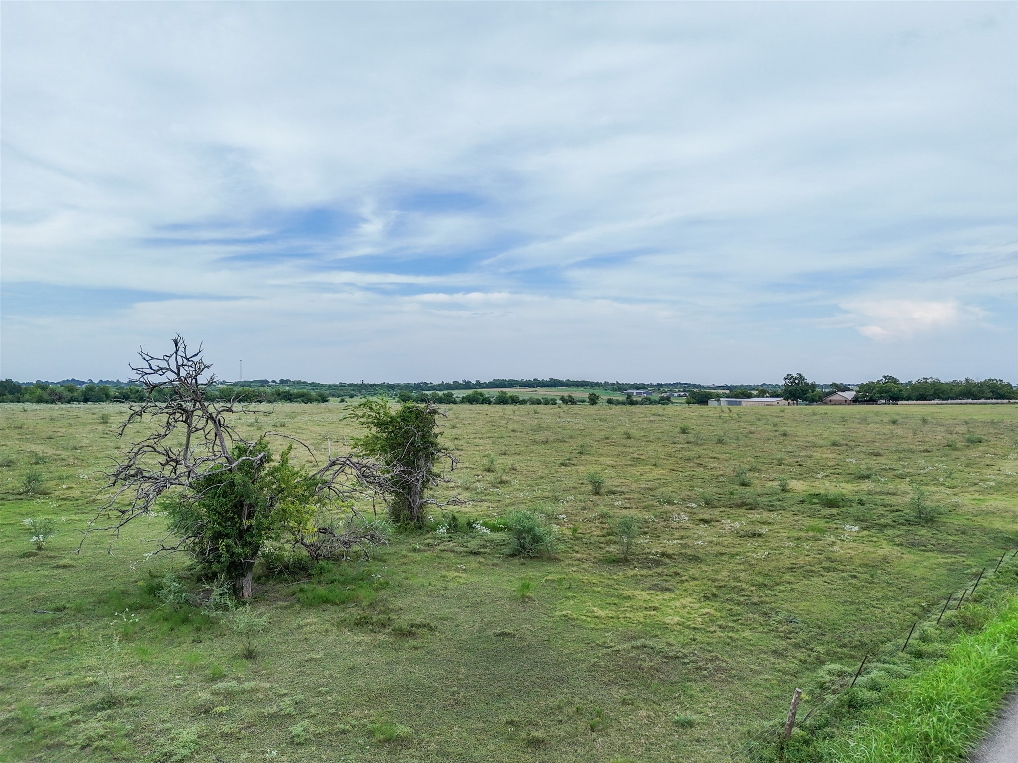 5211 Chadwick-Hogan Road Chappell Hill, TX 77426 - Photo 20 of 20 a view of a lake and mountain in back