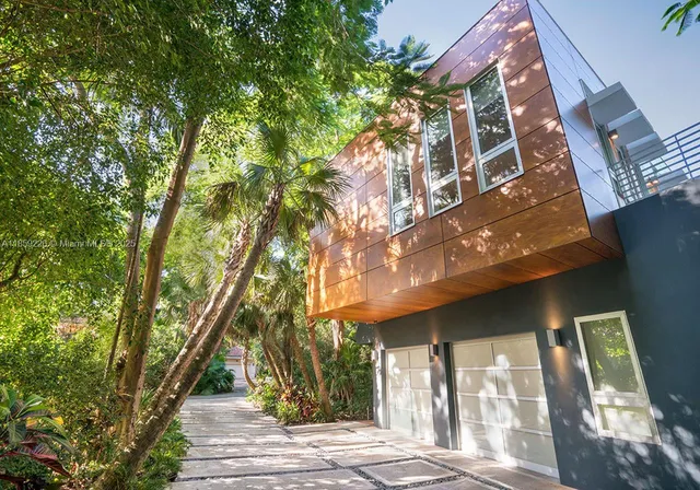 a view of a building with a tree