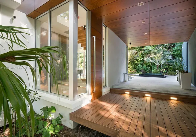 a view of a backyard with garden