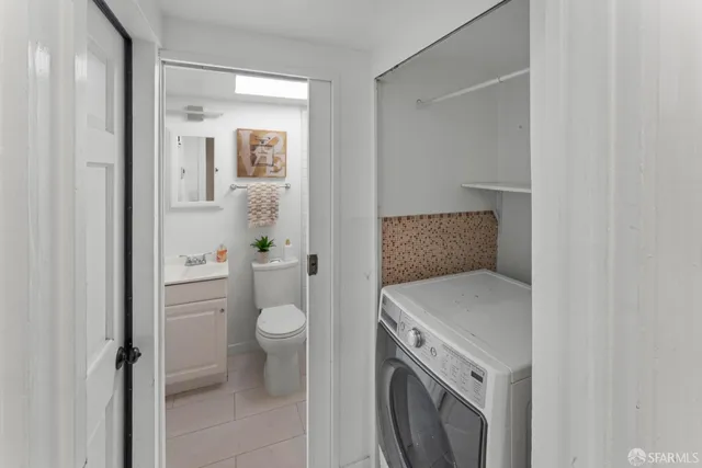 a bathroom with a sink and toilet