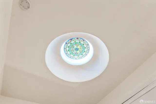 a small pool with red door