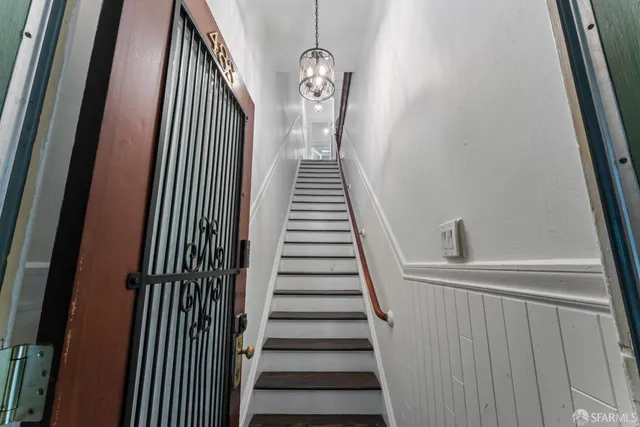 a view of entryway with wooden floor