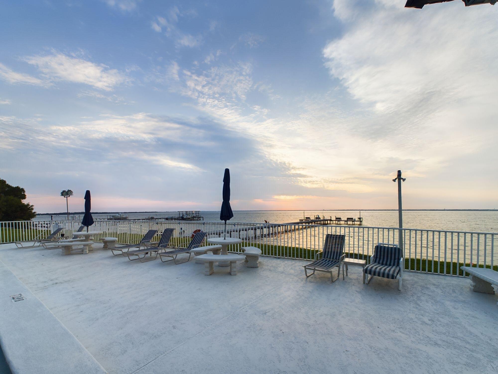 151 Calhoun Avenue, Unit 108 Destin, FL 32541 - Photo 20 of 30 a view of a terrace with lawn chairs