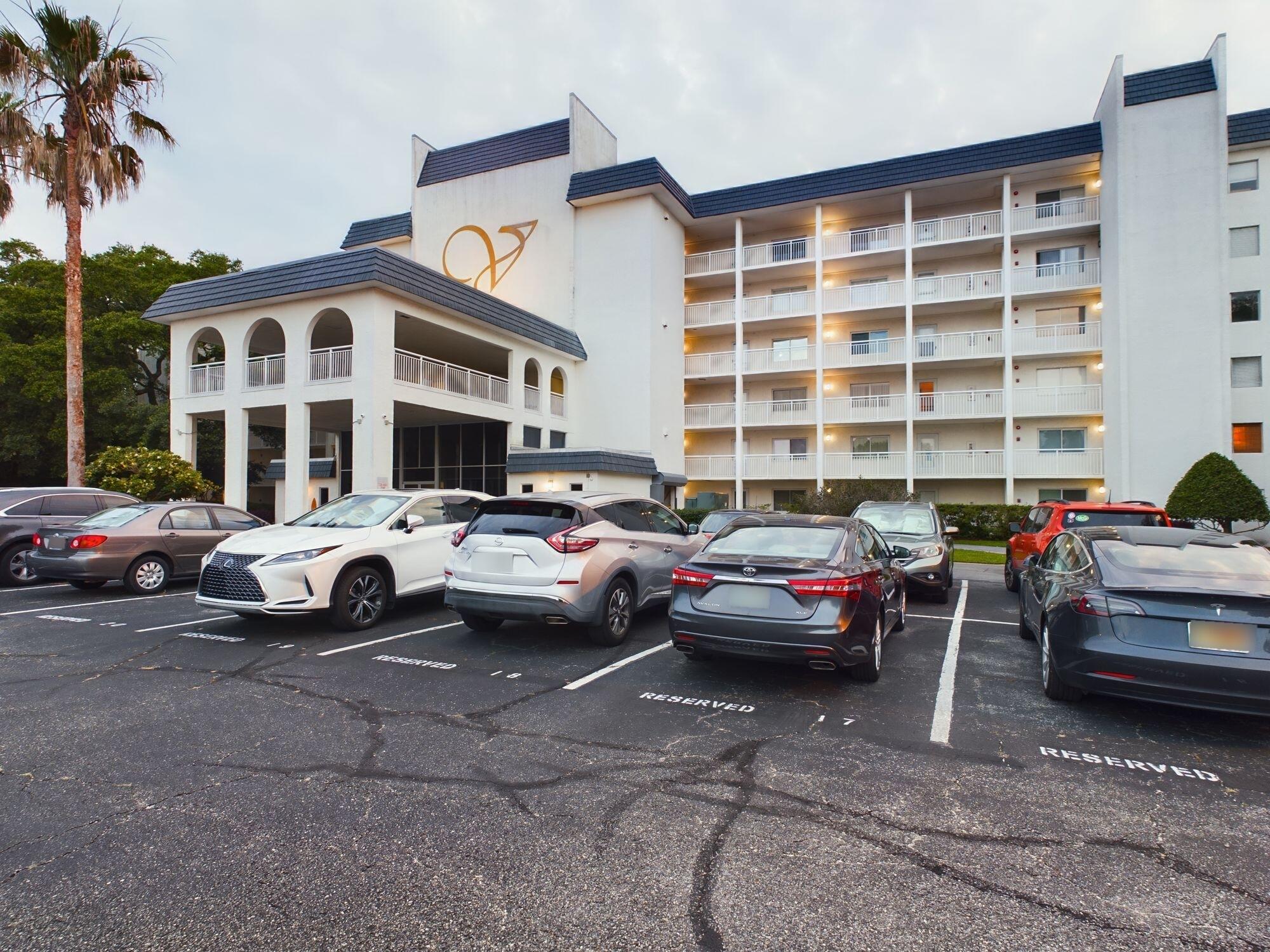 151 Calhoun Avenue, Unit 108 Destin, FL 32541 - Photo 2 of 30 a view of a cars park in front of a building