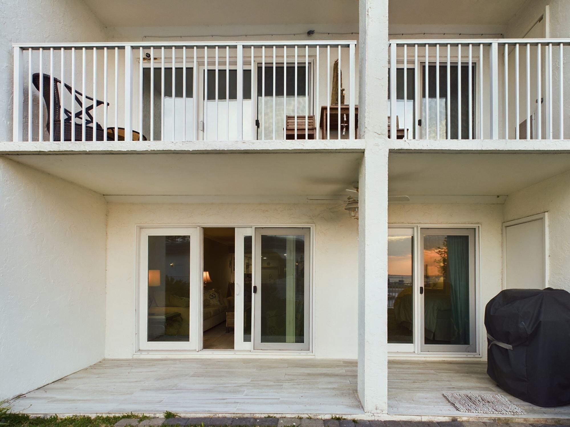 151 Calhoun Avenue, Unit 108 Destin, FL 32541 - Photo 27 of 30 a view of a house with entryway and a wooden door