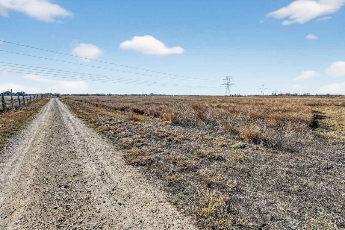 1557 Scull Road, Unit TRACT X San Marcos, TX 78666 - Photo 18 of 38 View of dirt / gravel road with a rural view