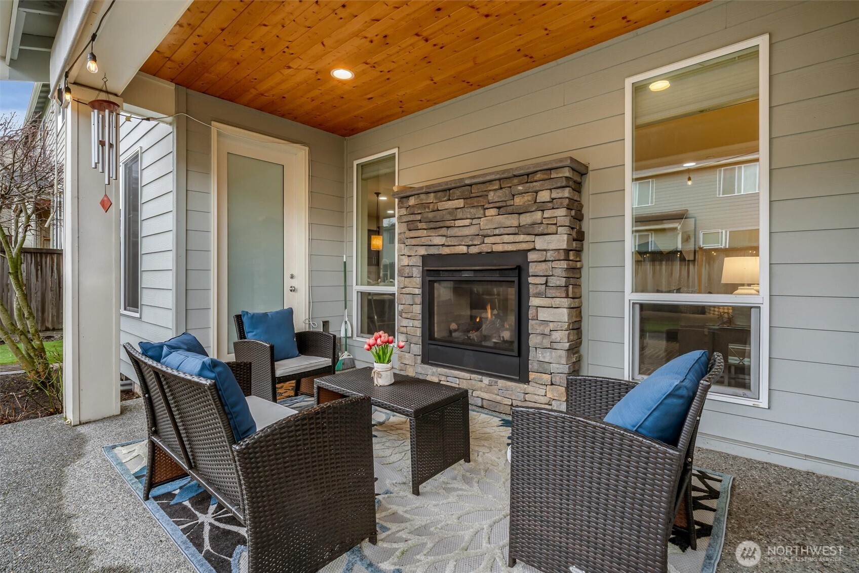 832 231st Street Southeast Bothell, WA 98021 - Photo 36 of 39 a living room with furniture and a fireplace