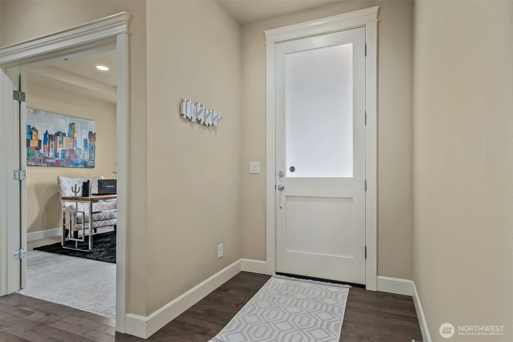 832 231st Street Southeast Bothell, WA 98021 - Photo 4 of 39 a view of a hallway and a livingroom with furniture