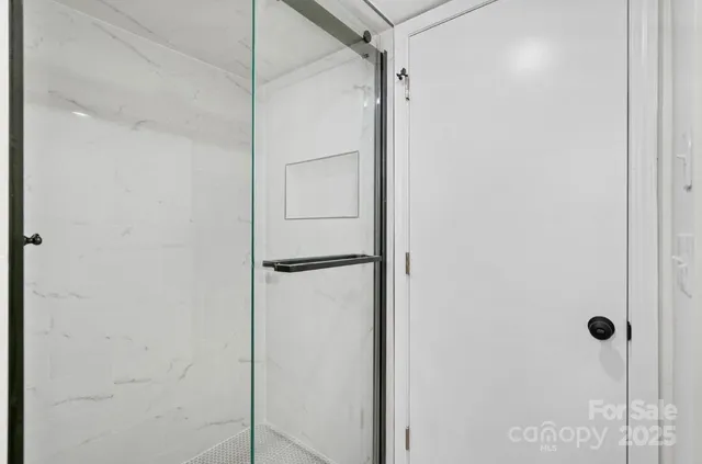a view of a storage & utility room with washer and dryer