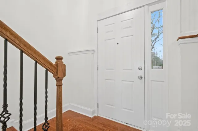 a view of entryway with wooden floor