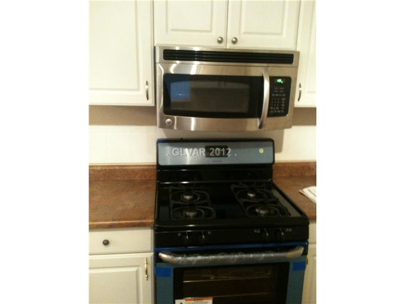 Kitchen. Brand New Stainless Range and Microwave!