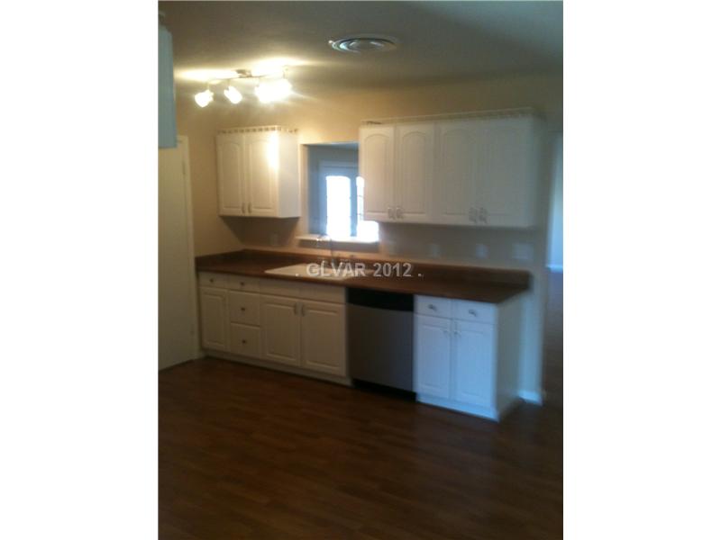 1316 Pinto Road Boulder City, NV 89005 - Photo 8 of 10 Kitchen. Nice Modern Kitchen with Pantry and serving window to Family room!