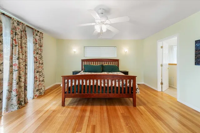 a kitchen with stainless steel appliances granite countertop a sink and a stove with refrigerator