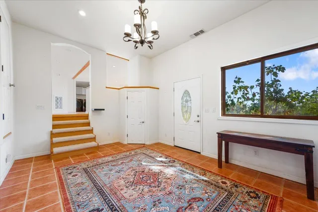 a view of a backyard with large trees