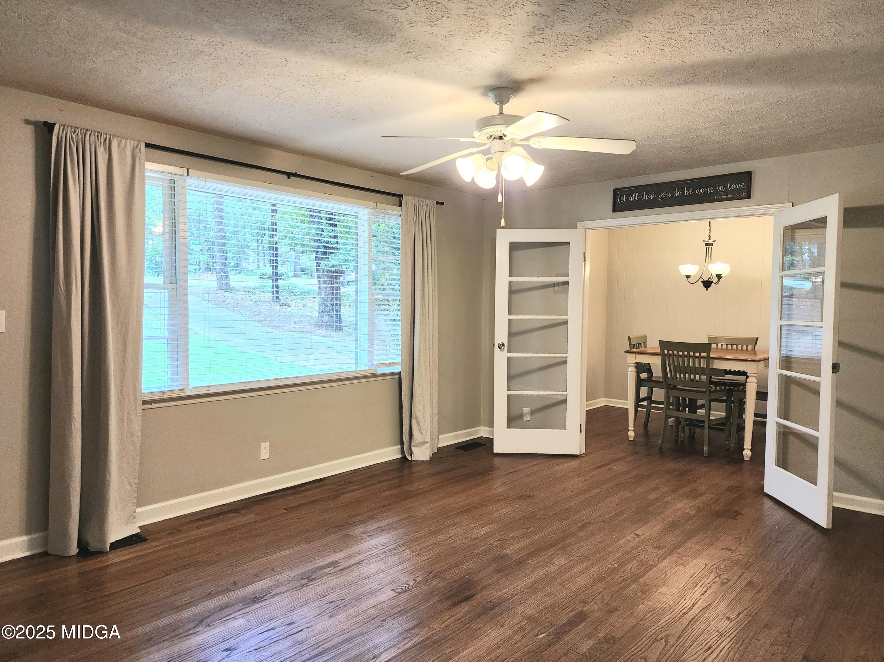 807 Wera Place Macon, GA 31210 - Photo 24 of 42 an empty room with wooden floor closet and windows