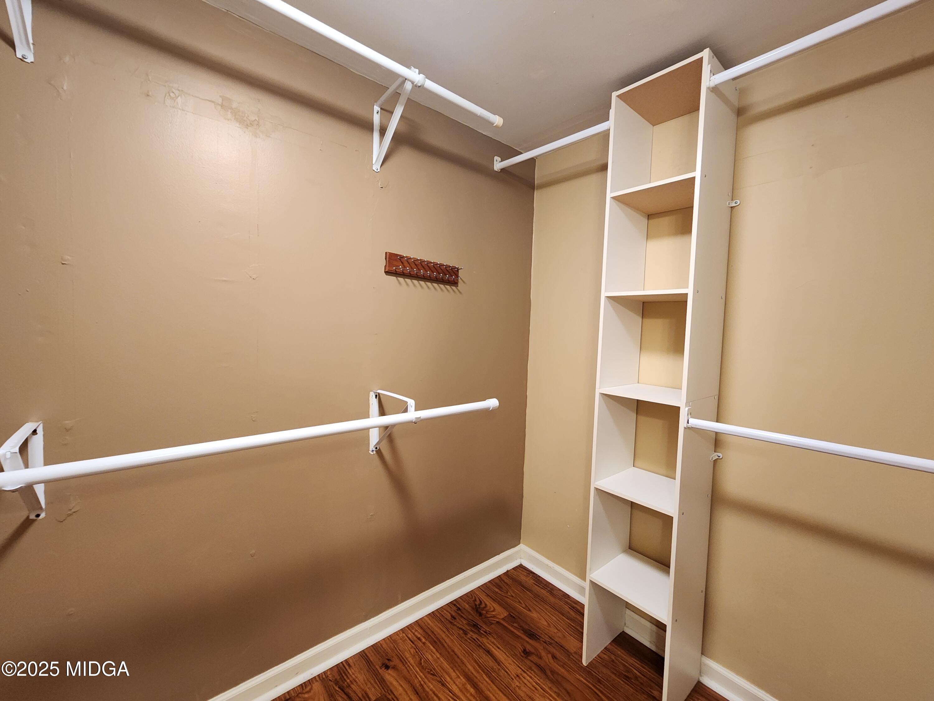 807 Wera Place Macon, GA 31210 - Photo 30 of 42 a view of walk in closet with empty racks