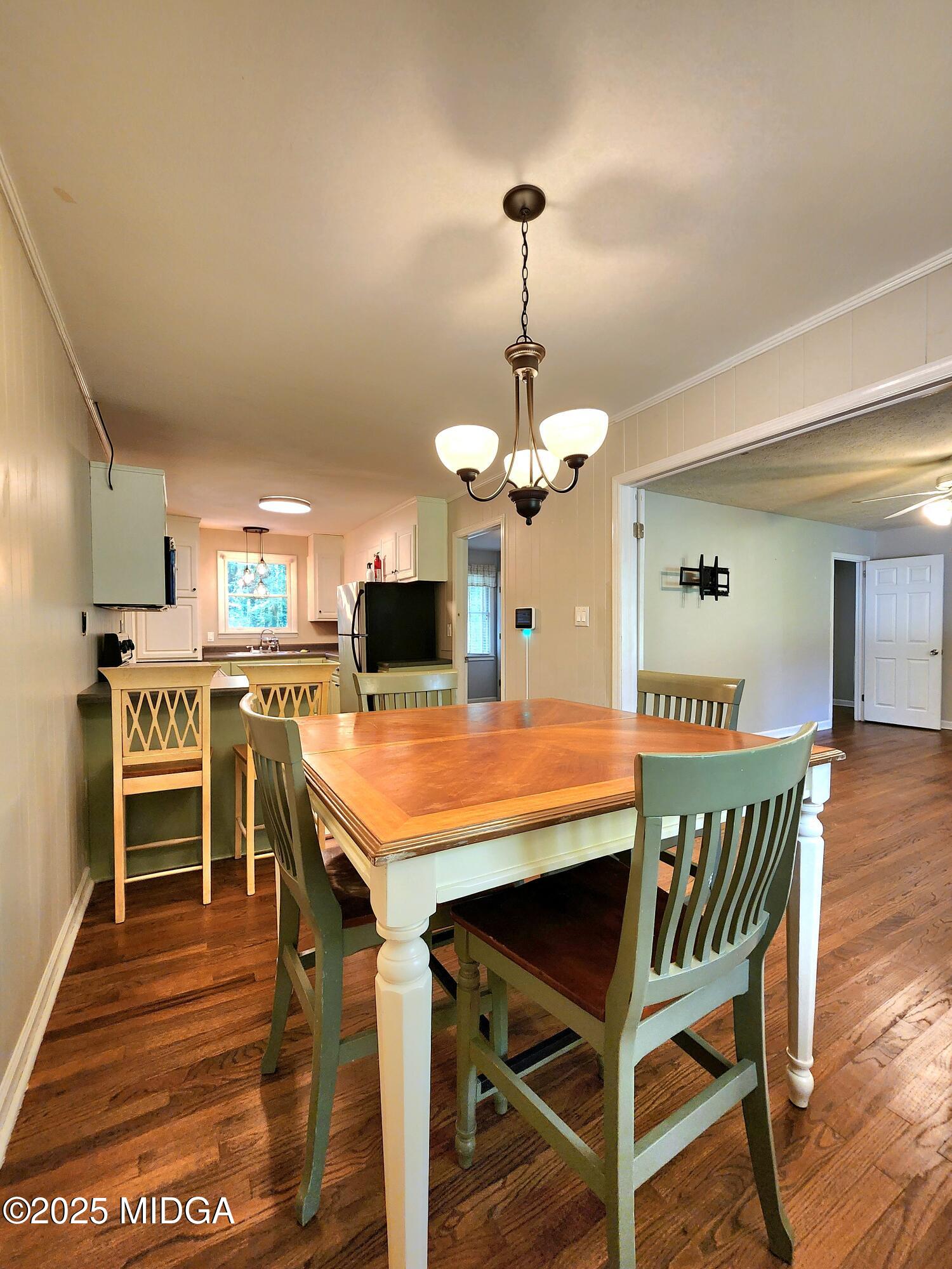 807 Wera Place Macon, GA 31210 - Photo 8 of 42 a view of a dining room with furniture and wooden floor