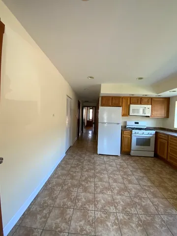a view of a kitchen with a sink