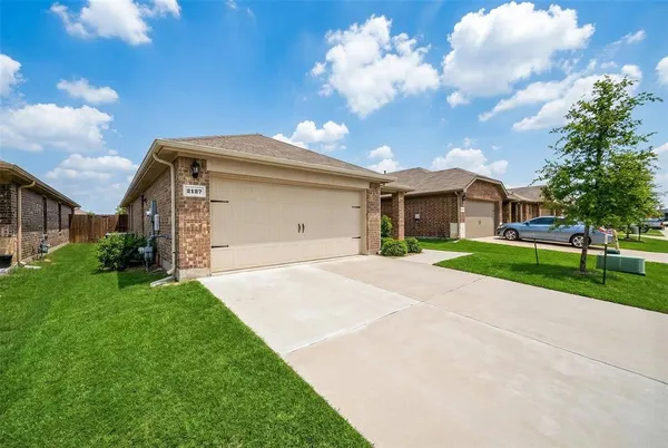 a front view of house with yard