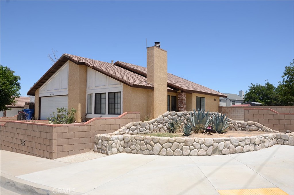 43600 Santa Rosa Circle Lancaster, CA 93535 - Photo 6 of 25 a house view with a outdoor space