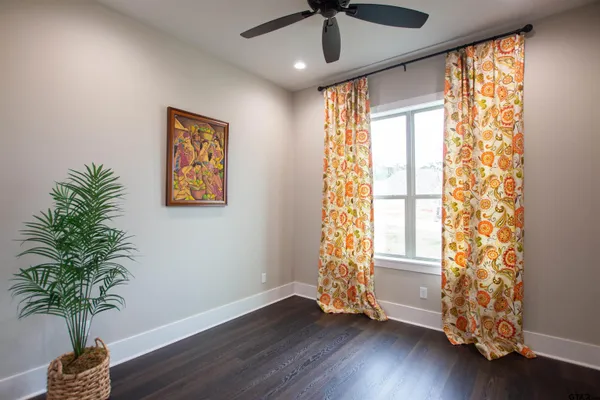 a view of entryway with wooden floor and a potted plant
