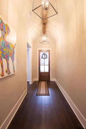 a view of entryway with wooden floor