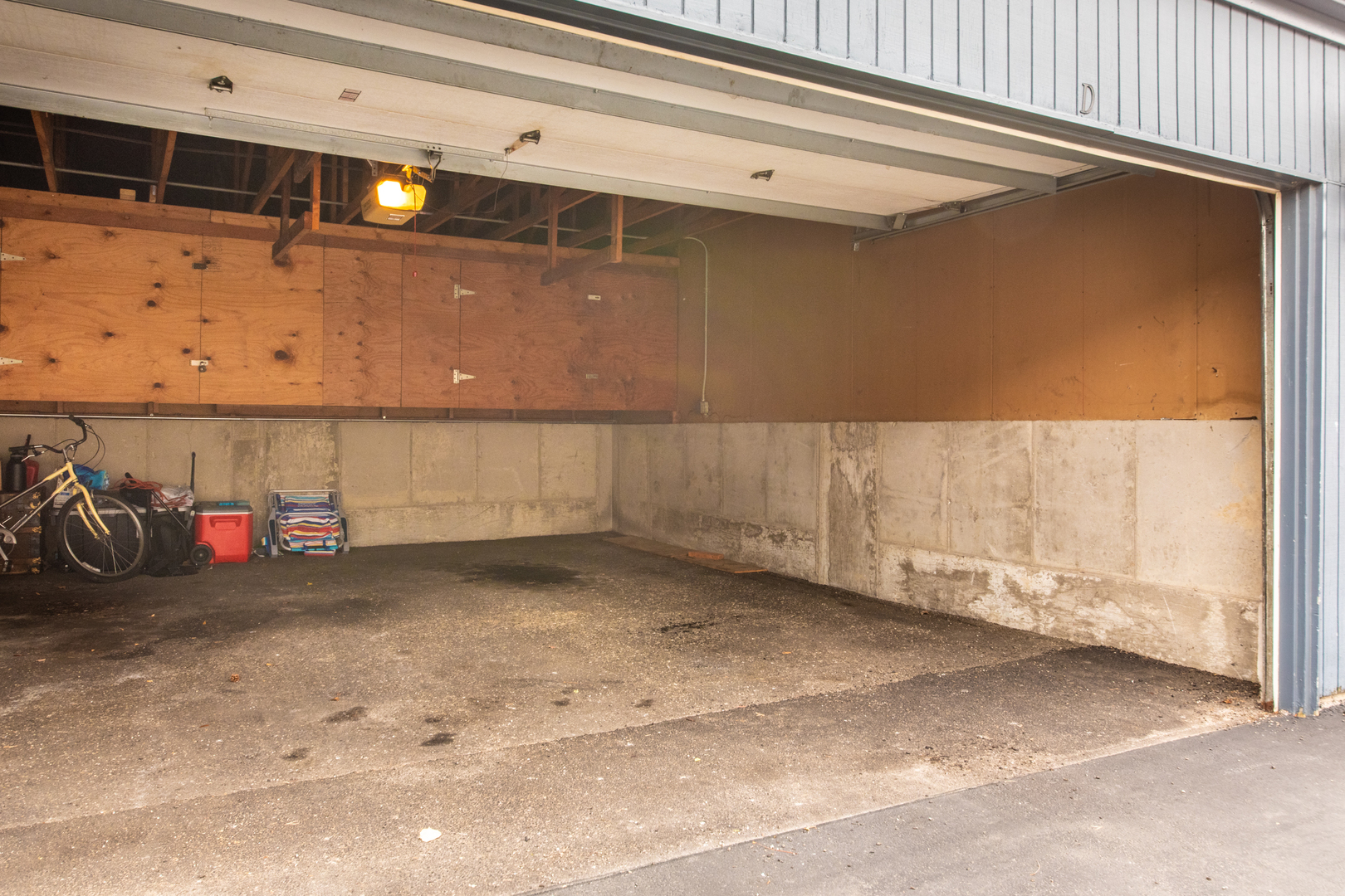 2021 Ammer Ridge Court, Unit 202 Glenview, IL 60025 - Photo 20 of 24 a view of a garage with rack and bicycle