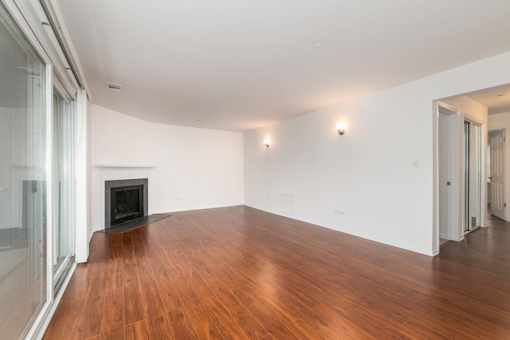 2021 Ammer Ridge Court, Unit 202 Glenview, IL 60025 - Photo 4 of 24 a view of empty room with wooden floor
