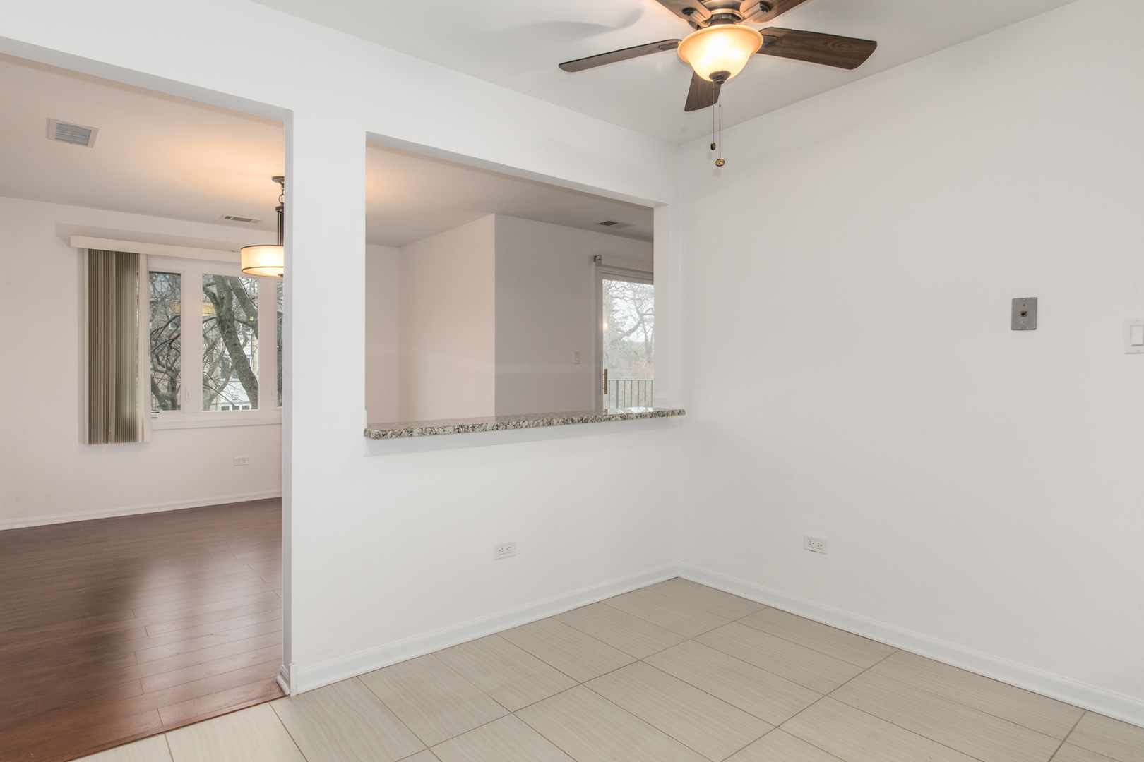 2021 Ammer Ridge Court, Unit 202 Glenview, IL 60025 - Photo 7 of 24 a view of a livingroom with a window