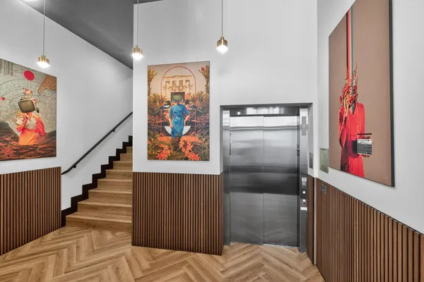 a bedroom with a bed and furniture