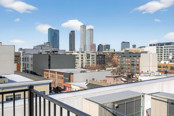 a view of a city from a balcony