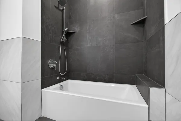 a bathroom with a white bath tub