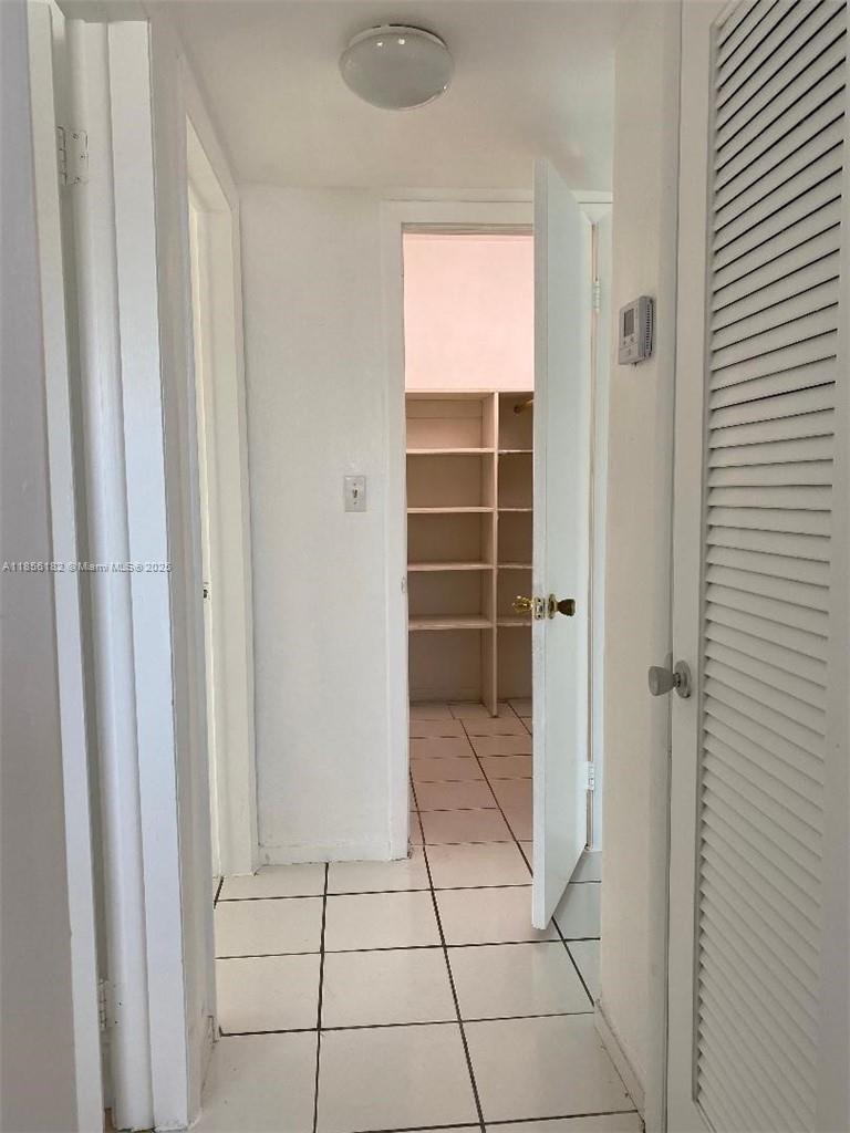 1855 Plunkett Street, Unit 101 Hollywood, FL 33020 - Photo 20 of 24 a view of empty room