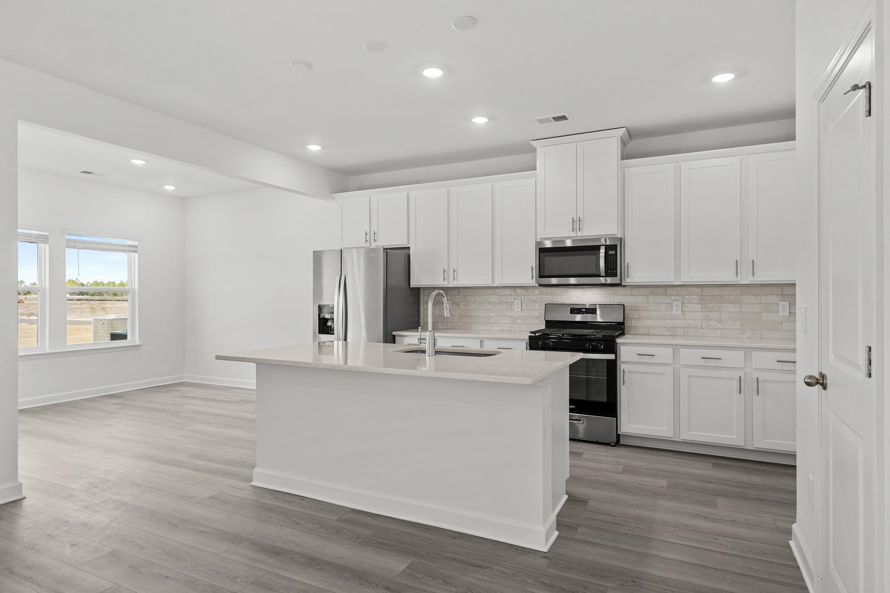 8225 Sparkle Drive Longs, SC 29568 - Photo 5 of 18 Photo is not of the actual home, but is an example photo of a completed home and may depict options and/or features that are not included