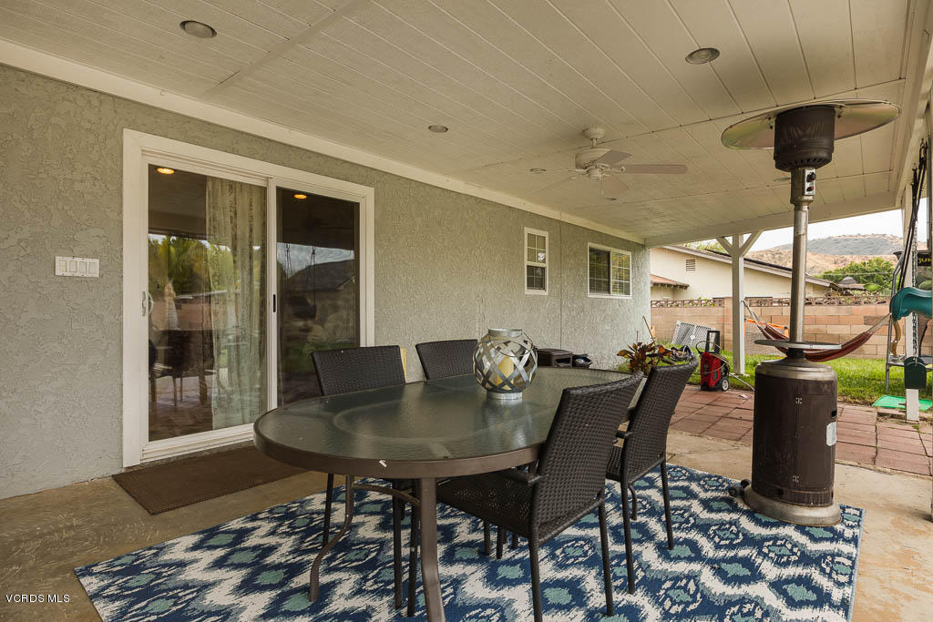 2175 Fig Street Simi Valley, CA 93063 - Photo 14 of 21 a view of a dining room with furniture and chandelier