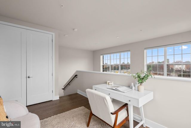 a living room with furniture and window