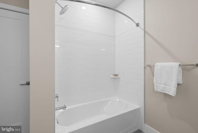 a close view of a bathtub in bathroom