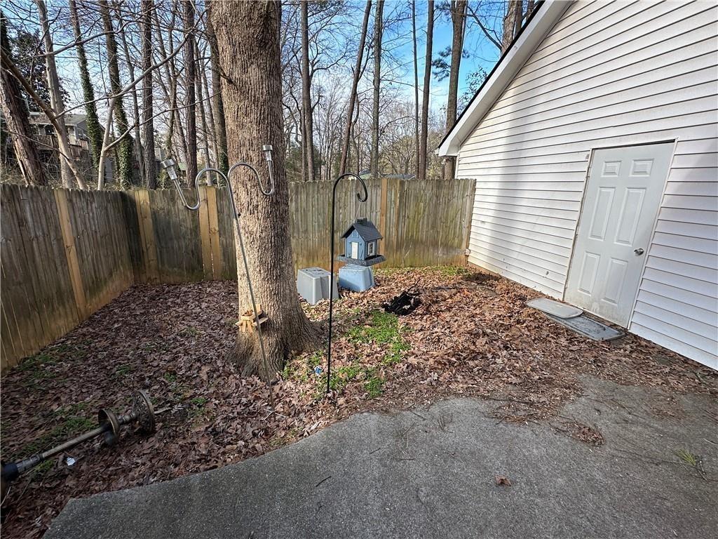 771 Farm Creek Road Northeast Woodstock, GA 30188 - Photo 9 of 14 a front view of a house with garden