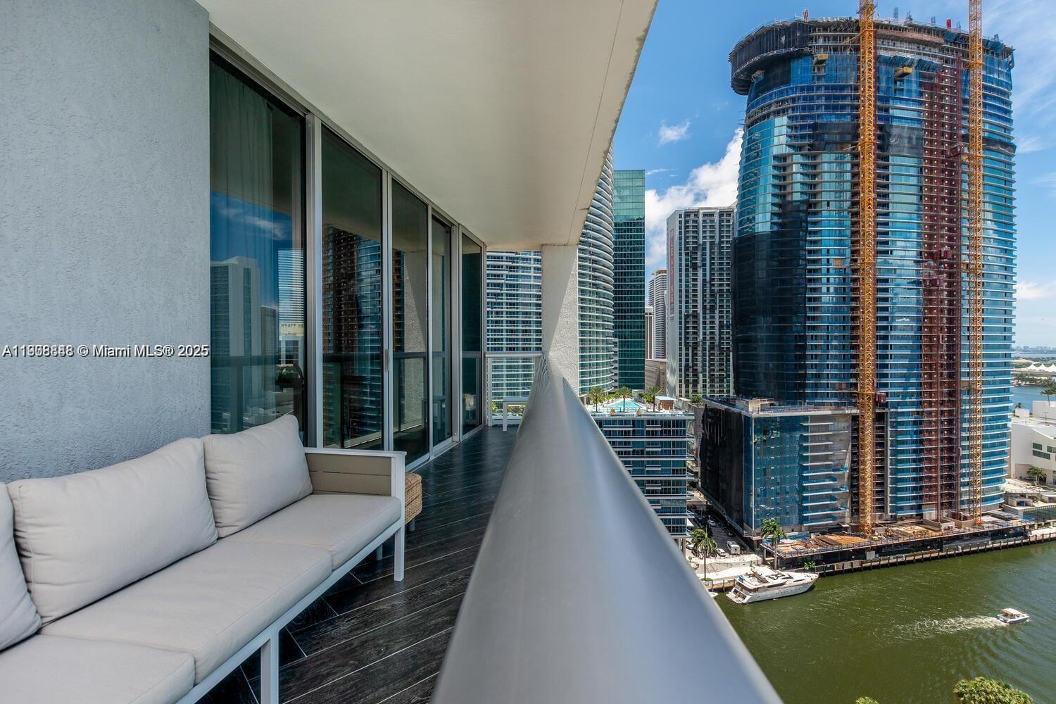 485 Brickell Avenue, Unit 2302 Miami, FL 33131 - Photo 19 of 20 a view of balcony with couch