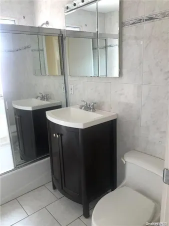a bathroom with a sink and a toilet