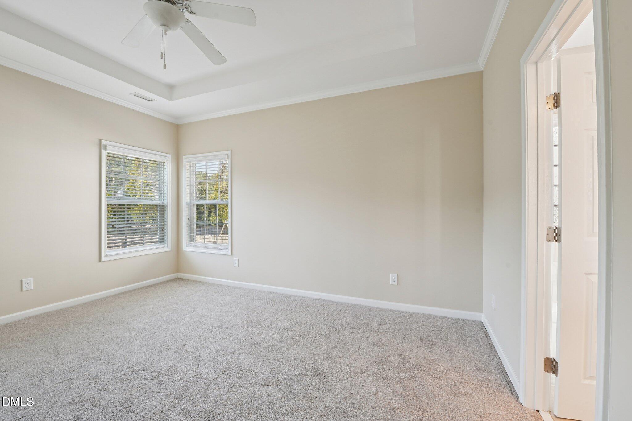 11 Hidden Ridge Court Durham, NC 27707 - Photo 15 of 30 a view of an empty room with a window