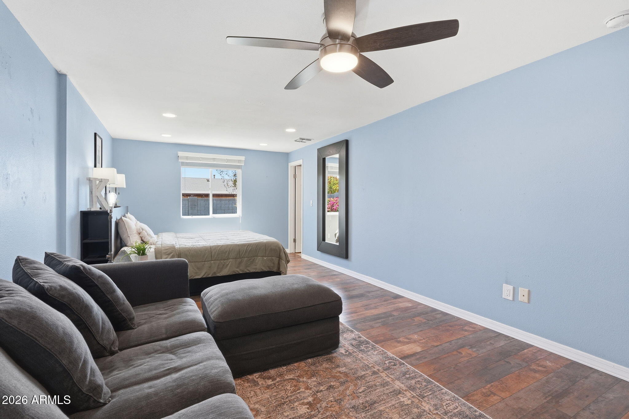 3765 East Pershing Avenue Phoenix, AZ 85032 - Photo 19 of 48 a living room with furniture and a ceiling fan