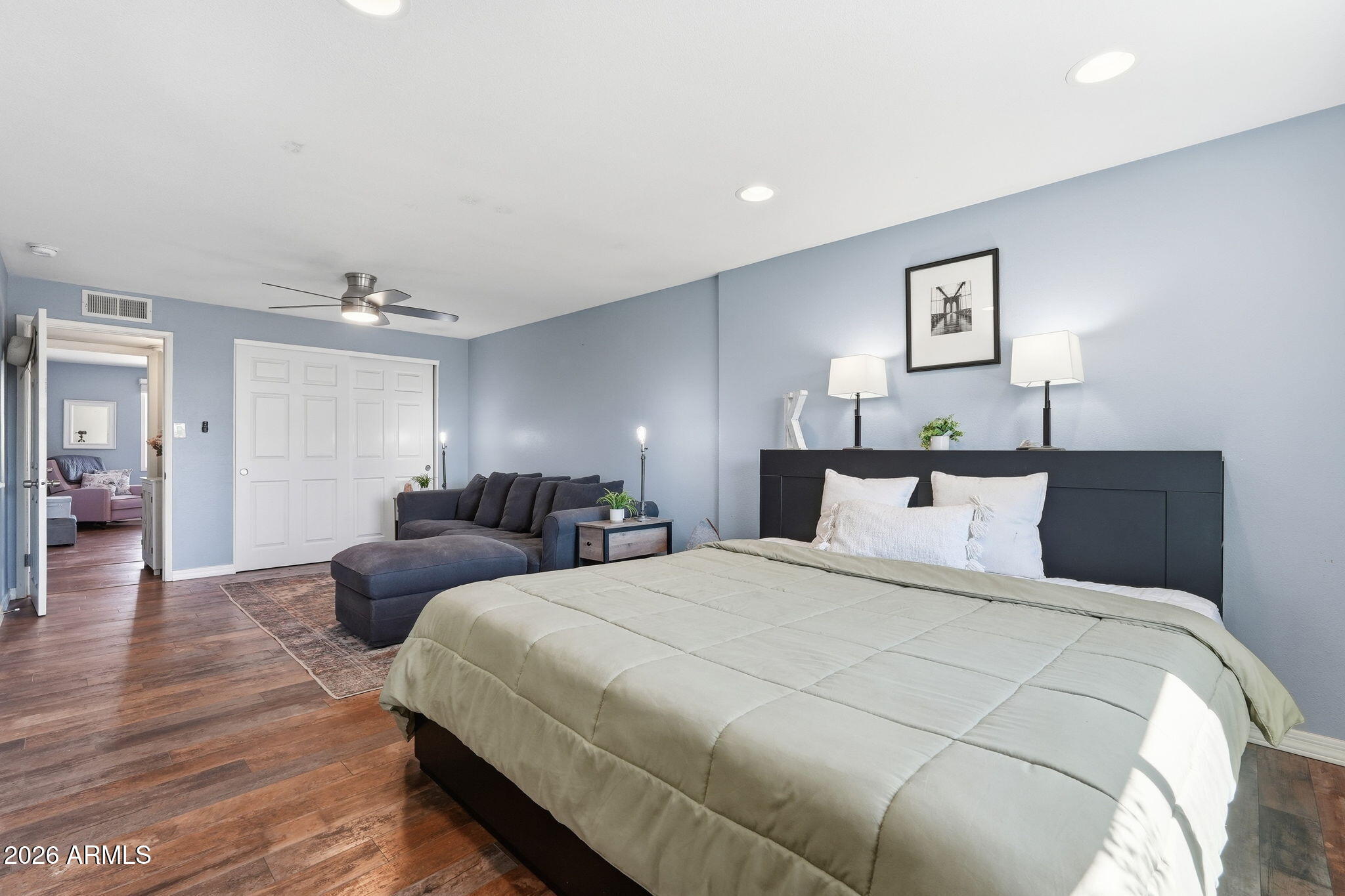 3765 East Pershing Avenue Phoenix, AZ 85032 - Photo 20 of 48 a bedroom with double bed and a night stand