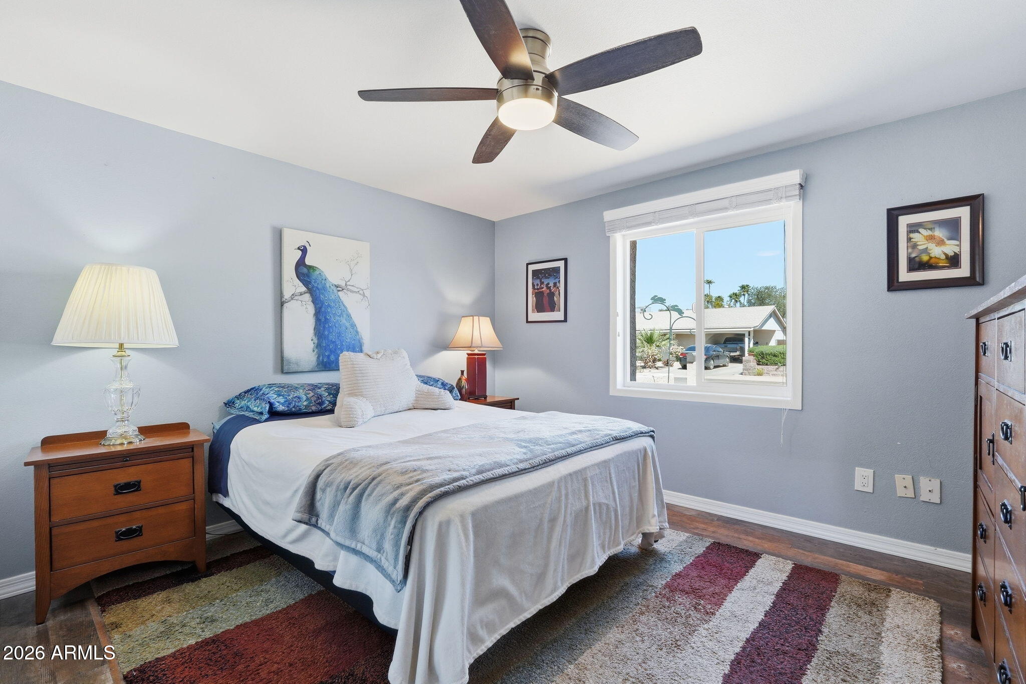 3765 East Pershing Avenue Phoenix, AZ 85032 - Photo 22 of 48 a bedroom with a bed and a window