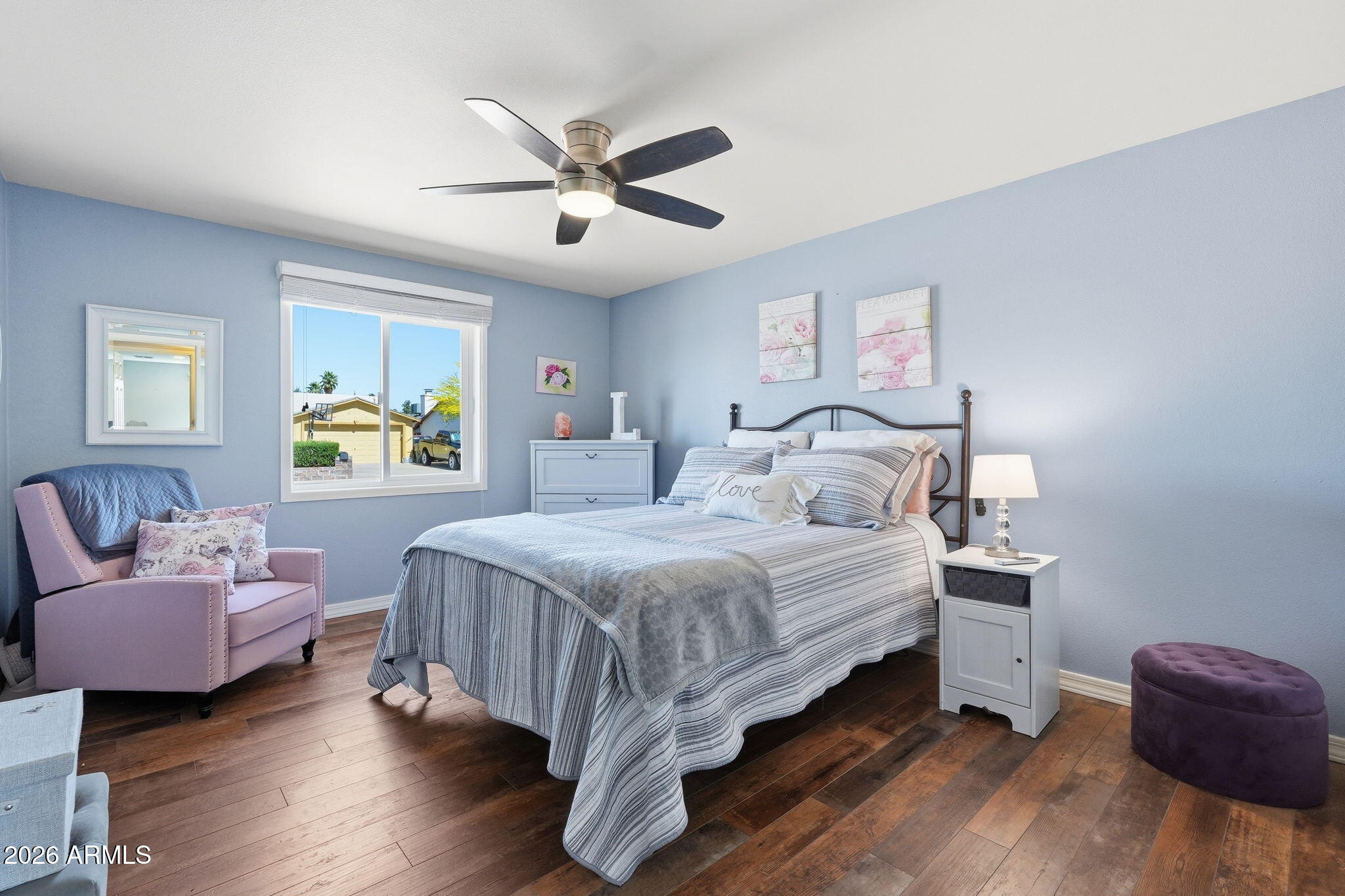 3765 East Pershing Avenue Phoenix, AZ 85032 - Photo 24 of 48 a bedroom with a bed and wooden floor