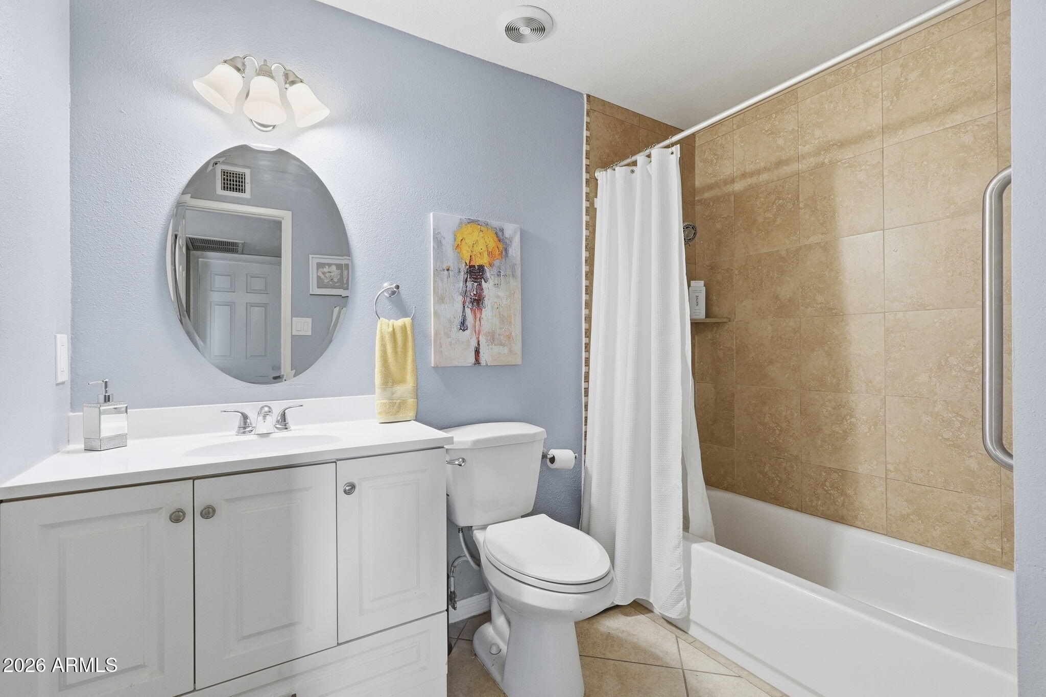 3765 East Pershing Avenue Phoenix, AZ 85032 - Photo 28 of 48 a bathroom with a toilet a sink and a bathtub